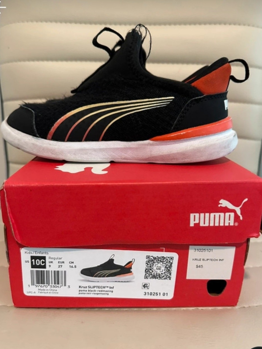 Puma Kids Black and Orange Slip-On Sneaker with Gold Accent